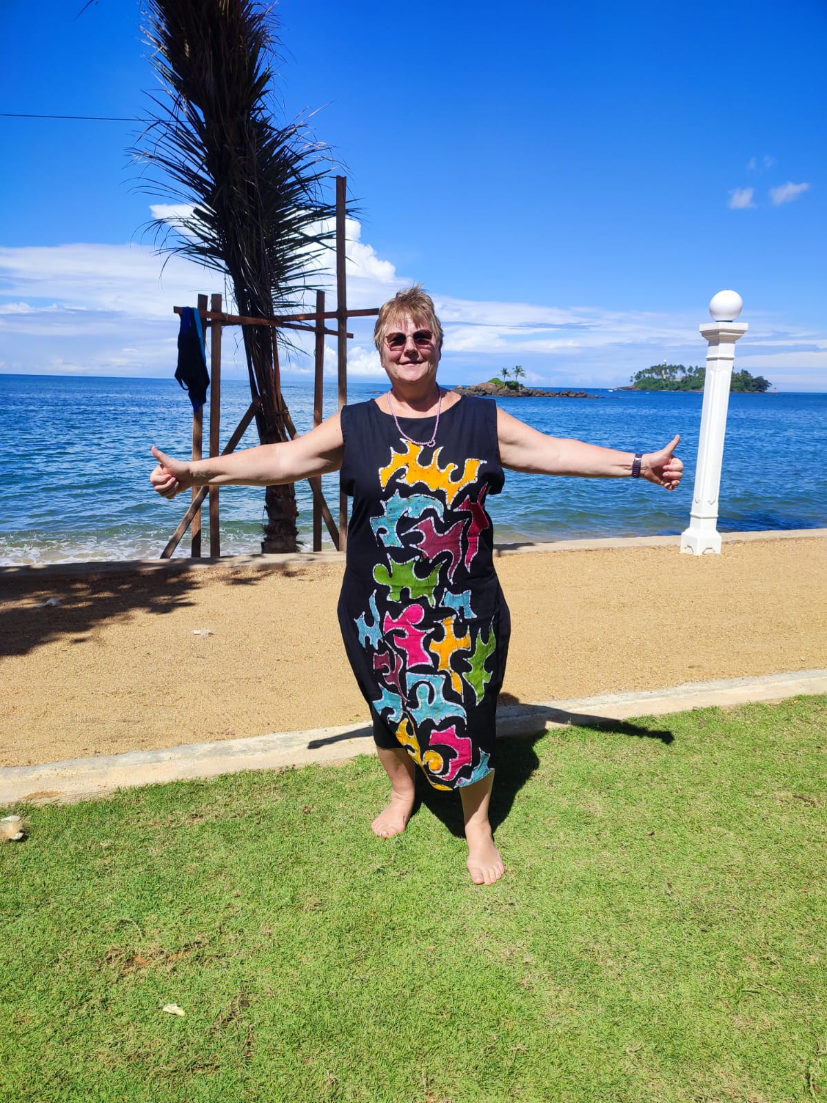 A guest enjoying the sunshine beside the ocean on Sri Lanka's southern coast