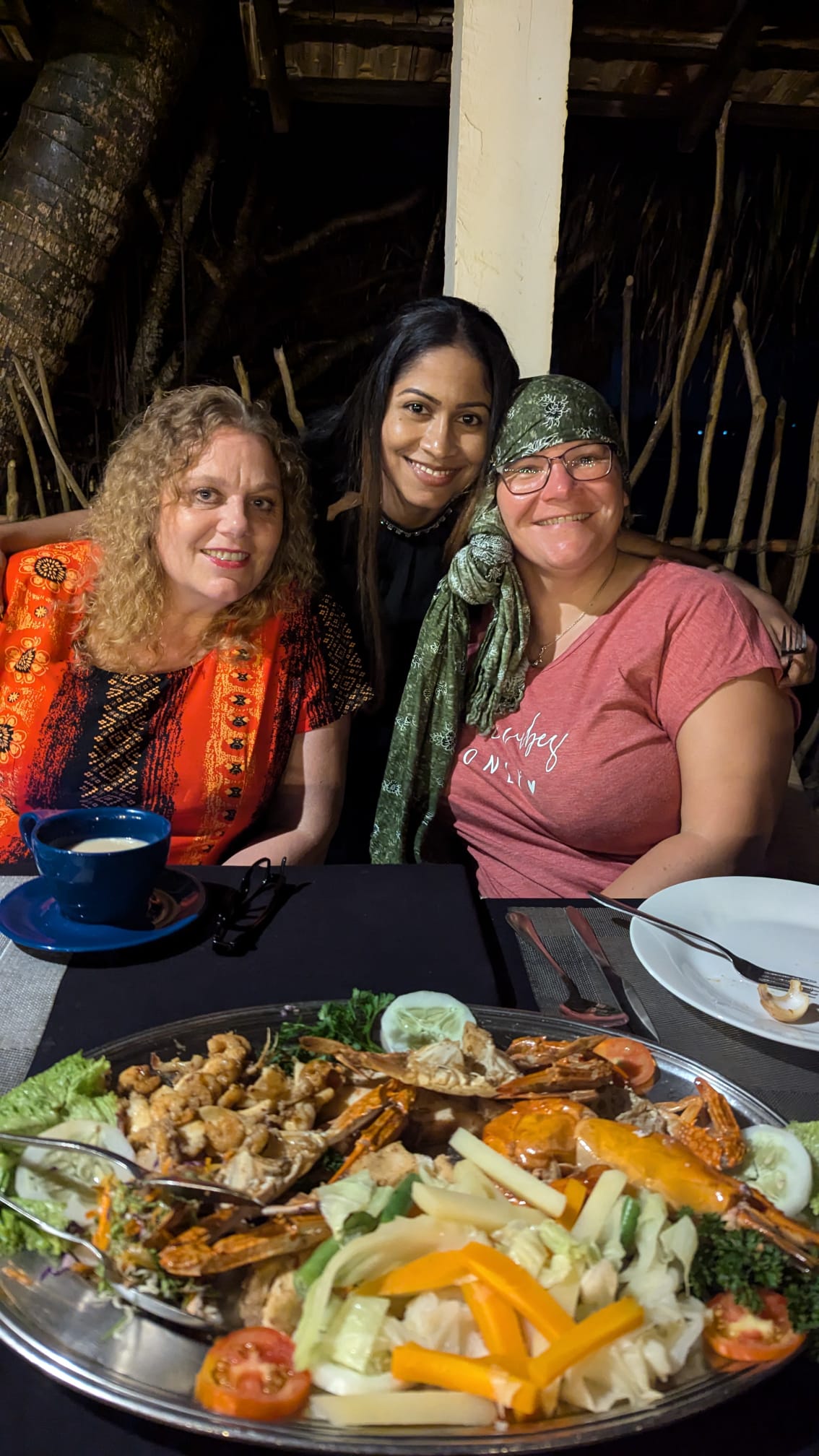 Guests enjoying a fresh Sri Lankan seafood dinner with their local host