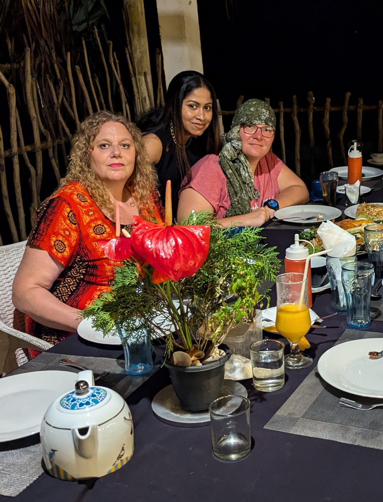 Guests sharing a relaxed Sri Lankan dinner with their local tour host